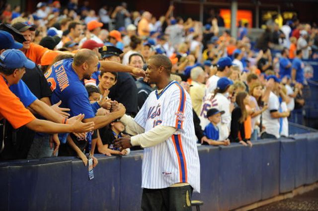 Gooden, seen here in 2008, greeting fans after the final game ever played at Shea Stadium